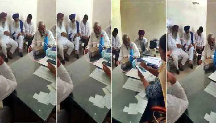 थाने में मेज पर रखी नोटों की गड्डियों का विडियो वायरल