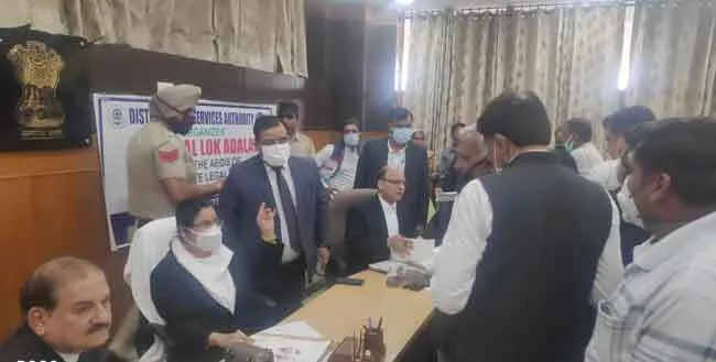 नेशनल लोक अदालत में 8401 मुकदमों का आपसी सहमति से किया निपटारा