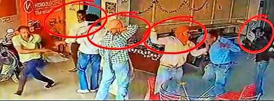 अज्ञात युवकों ने तलवार व डंडों से किया शोरूम मालिक पर हमला