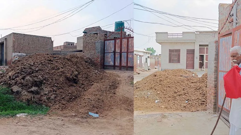 घर के आगे लगाया गोबर का ढेर, हो रही परेशानी