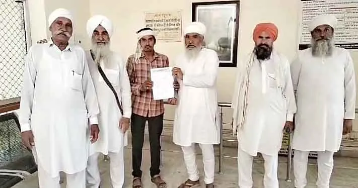 जमीन हड़पने के प्रयास का आरोप