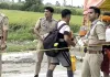 Kanwar Yatra: पुलिसकर्मियों ने शिवभक्तों को वितरित किया शीतल पेय व फलाहार