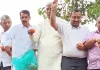भाजपा एमएलसी ने शिवभक्तों पर बुलडोजर से की पुष्पवर्षा