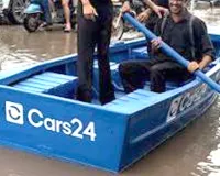 CARS24 Boat Challan: बरसाती पानी पर तंज के लिए सड़क पर उतारी नाव, पुलिस ने CARS24 पर लगाया 50 हजार का जुर्माना