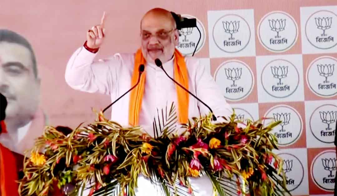 BJP Bankura Rally: भाजपा लाओ, हम सिंडिकेट चलाने वालों को उल्टा लटका देंगे: अमित शाह