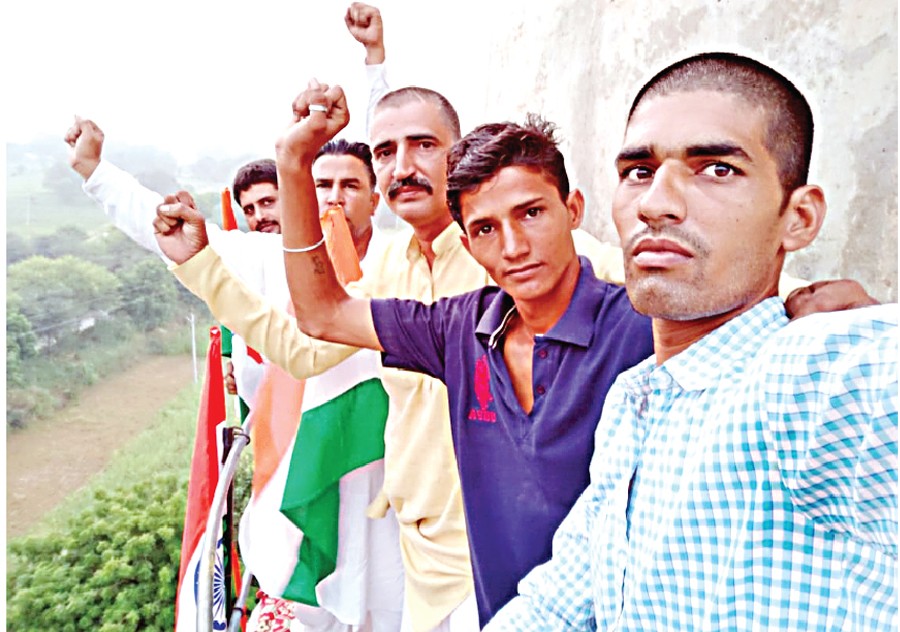 Farmers Climbing On Water Tank To Get Compensation