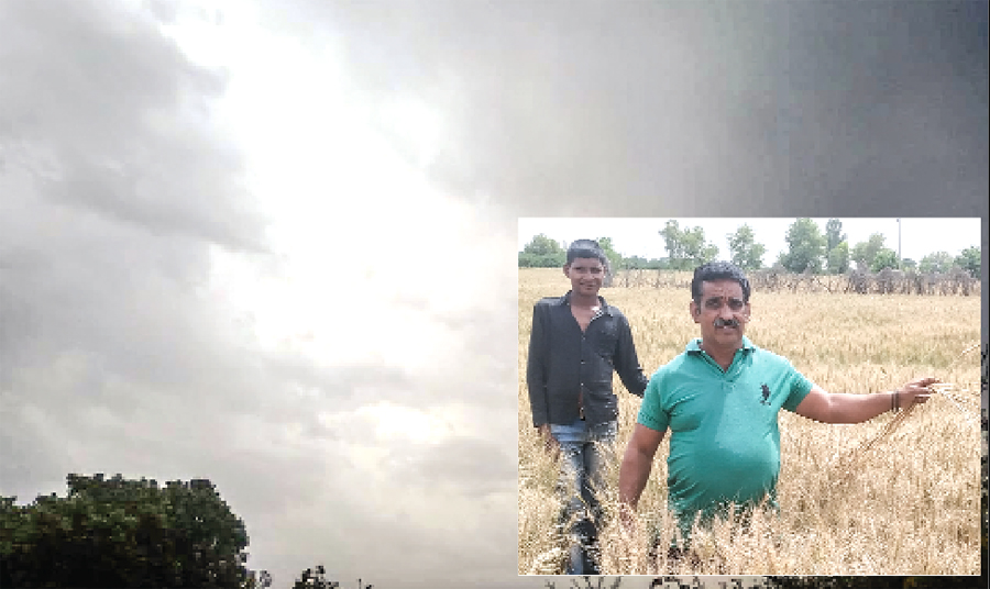 Farmer worried with light drizzling
