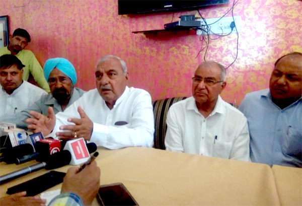 Hooda says no intention of contesting elections