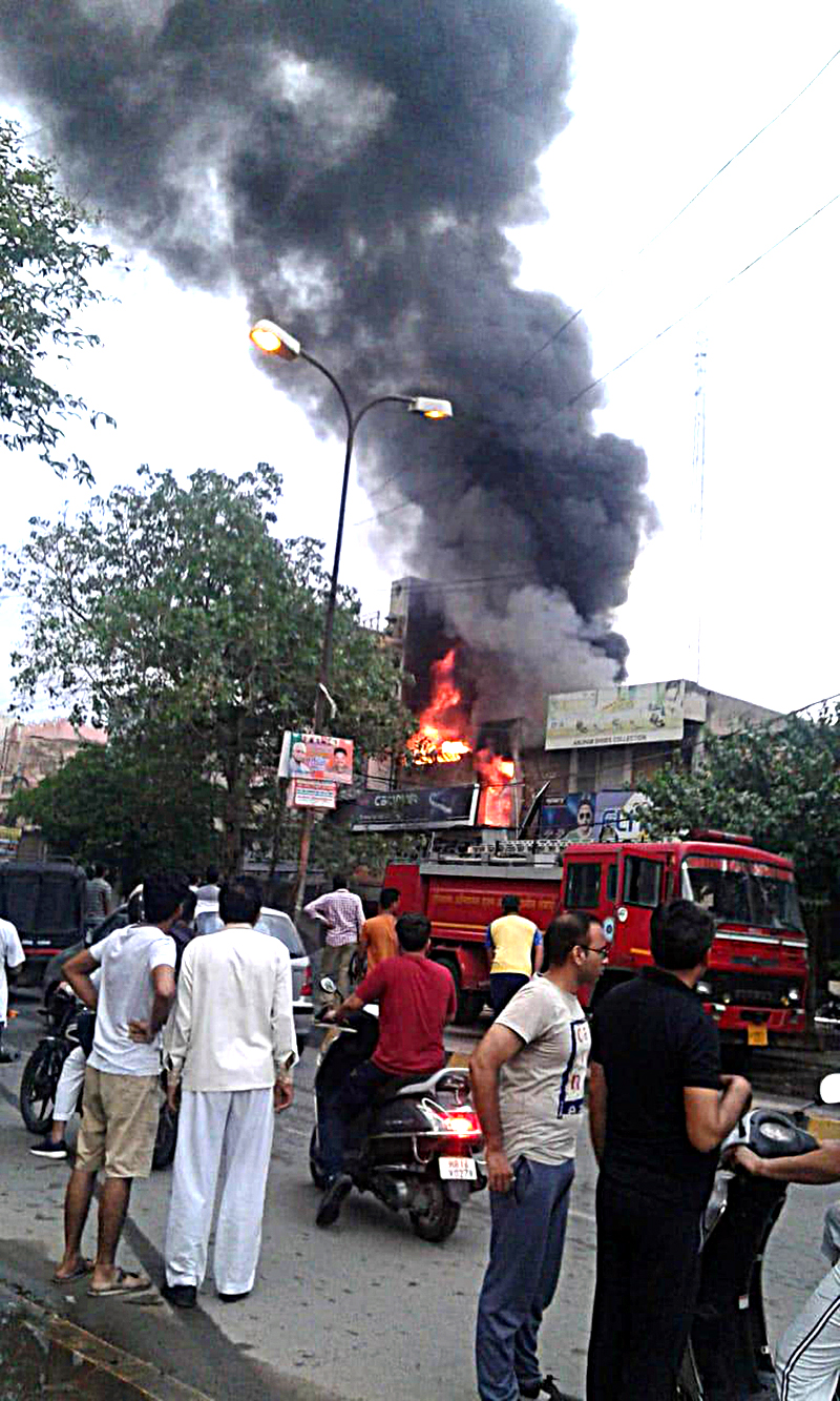 Fire in four shops, loss of millions