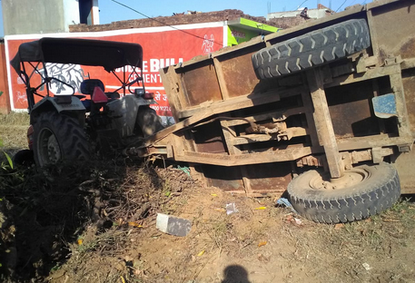 Tire bursts inverted tractor, driver dies