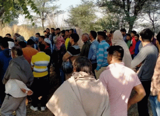 The body of the young man found hanging from a tree in the fields